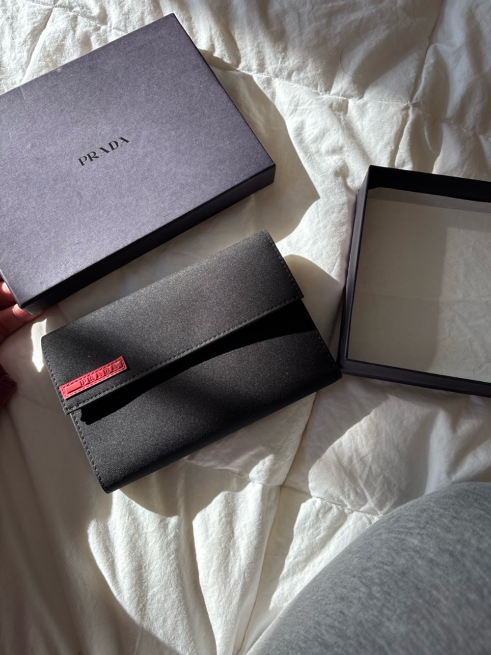 Prada Black Clutch Wallet with Red Logo Tab